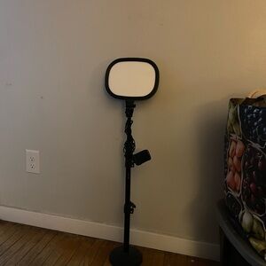 Adjustable computer light with phone attachment